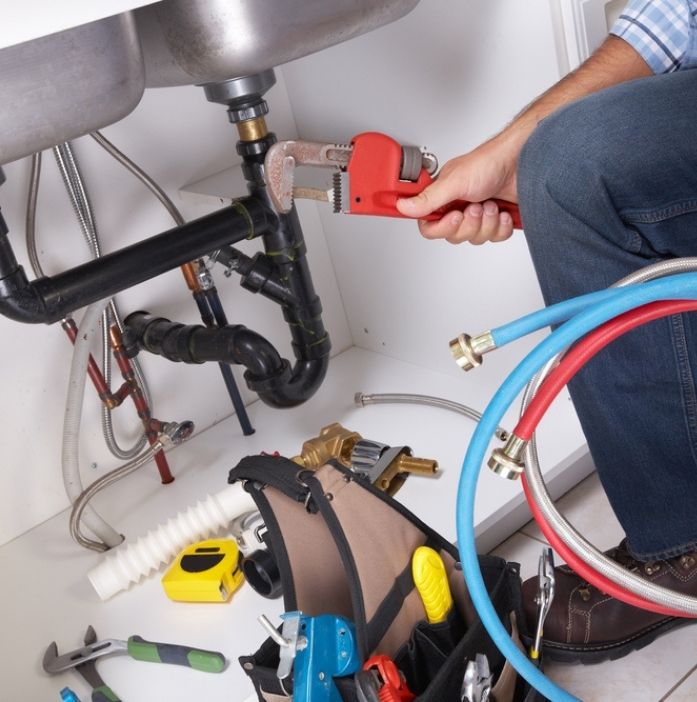 plumber under sink